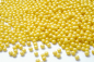 Preview: Sugar pearls large glitter yellow 140 g at sweetART