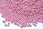 Sugar pearls large glitter pink 40 g